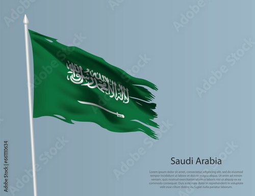Ragged national flag of Saudi Arabia. Wavy torn fabric on blue background