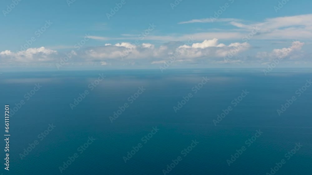 Seascape with blue sea surface. Blue sky with cloud. Mindanao, Philippines. Seascape with blue sea surface. Blue sky with cloud. Mindanao, Philippines.