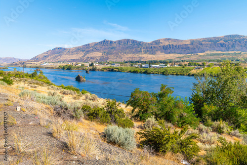 View of the blue Columbia River as it runs through the East Wenatchee high desert in the Central region of Washington State, Northwest USA.