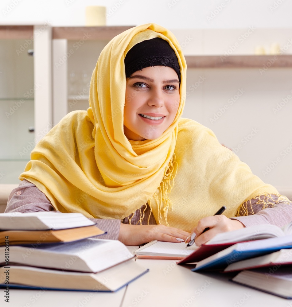 Female student in hijab preparing for exams Female student in hijab preparing for exams