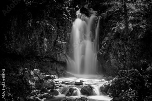 Long exposure in black and white of a waterfall in a forest
