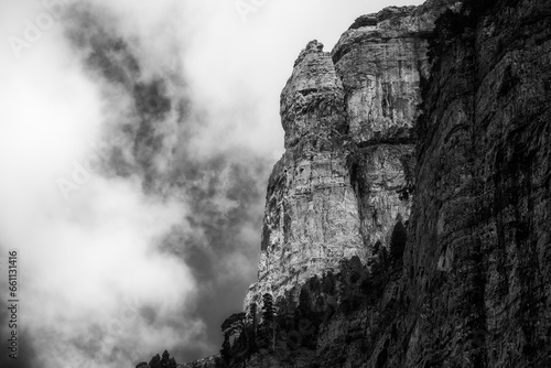 Mountains in black and white wth a cloudy backdrop