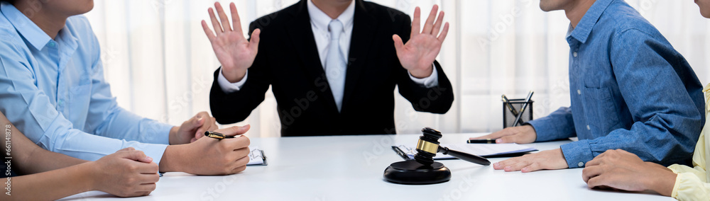 Lawyer acting as mediator broke a compromise between two parties to resolve business dispute through negotiation at law firm office. Legal mediation and conflict resolution service. Panorama Rigid - obrazy, fototapety, plakaty 