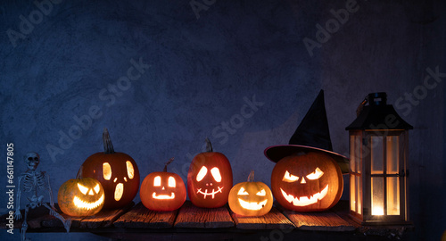 halloween background with jack'o'lanterns in the night
