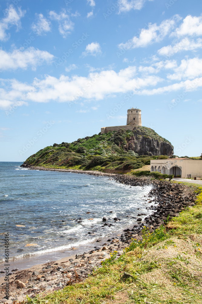 lighthouse on the shore of the island, Sardinia, Italy