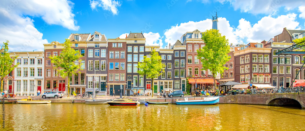 Panorama of Amsterdam city, scenic skyline over Amstel canal, Netherlands - obrazy, fototapety, plakaty 