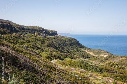 steep rocky slope, cliffs and sea