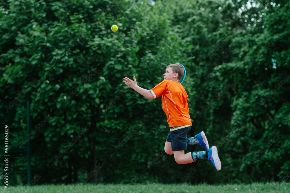 Child with tennis racket on tennis court. Training for young kid, healthy children. Horizontal sport theme poster, greeting cards, headers, website and app