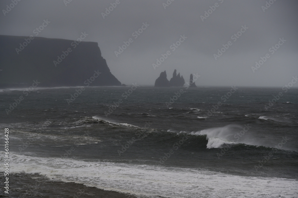 A dramatic sky with stormy weather on the seacoast in Iceland. A dramatic sky with stormy weather on the seacoast in Iceland.