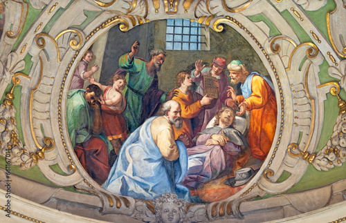 GENOVA, ITALY - MARCH 8, 2023: The fresco of death of St. Roch in the church Chiesa di San Rocco sopra Principe with the ceiling fresco by Giovanni Carlone (1584 – 1631).