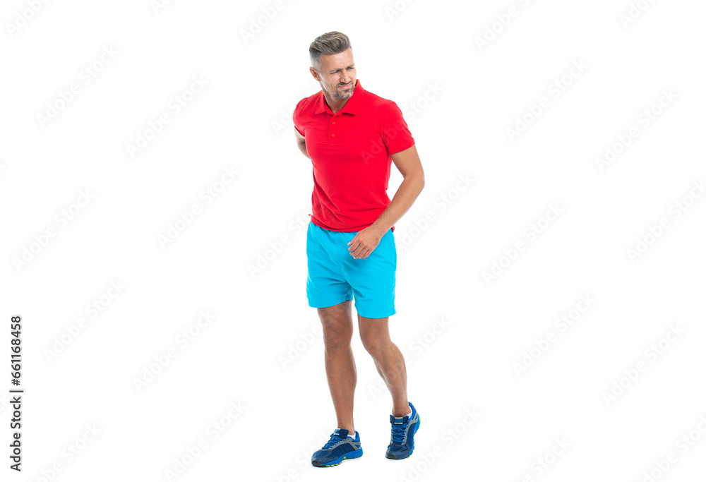 sport man suffering from a backache. sport man massages his lower back to alleviate discomfort of backache. sport man aching back muscles with backache. sport man feel the pain of backache sport man suffering from a backache. sport man massages his lower back to alleviate discomfort of backache. sport man aching back muscles with backache. sport man feel the pain of backache