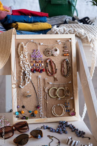 Swap party, market, second hand. Casual clothes, hats, bags and jewelry for sale. Event for exchange of clothes, shoes and accessories. Eco-friendly cloth exchange. Volunteering, donation