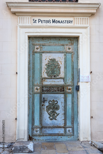 Door of Monastery of Saint Peter in Jaffa old town area in Tel Aviv city, Israel photo