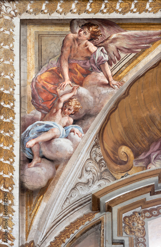 NAPLES, ITALY - APRIL 20, 2023: The fresco of angel in church Basilica di Santa Maria degli Angeli a Pizzofalcone by Giovan Battista Beinaschi (1668 - 1675).  photo