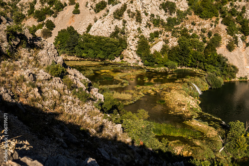 Landscape with a series of small waterfalls on Krupa river in Croatia
