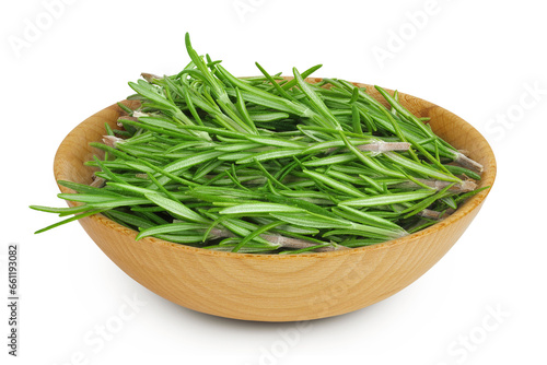 Rosemary twig and leaves in wooden bowl isolated on white background