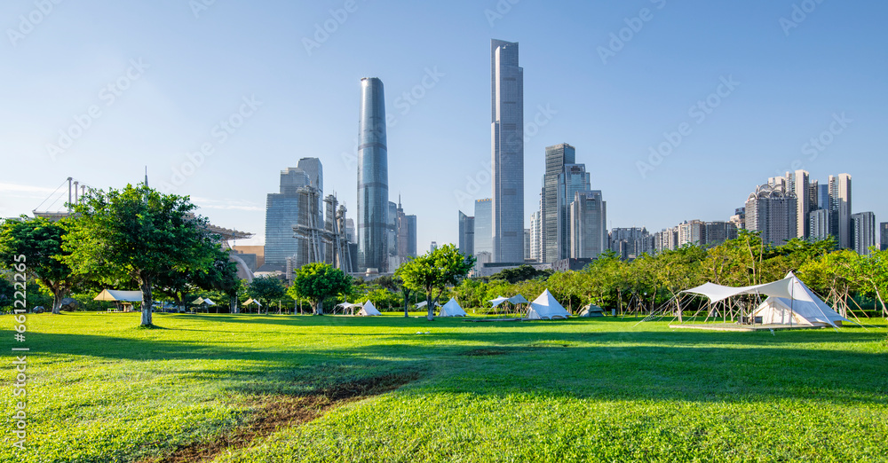 Early morning Guangzhou City Architecture and Park Camping Grassland