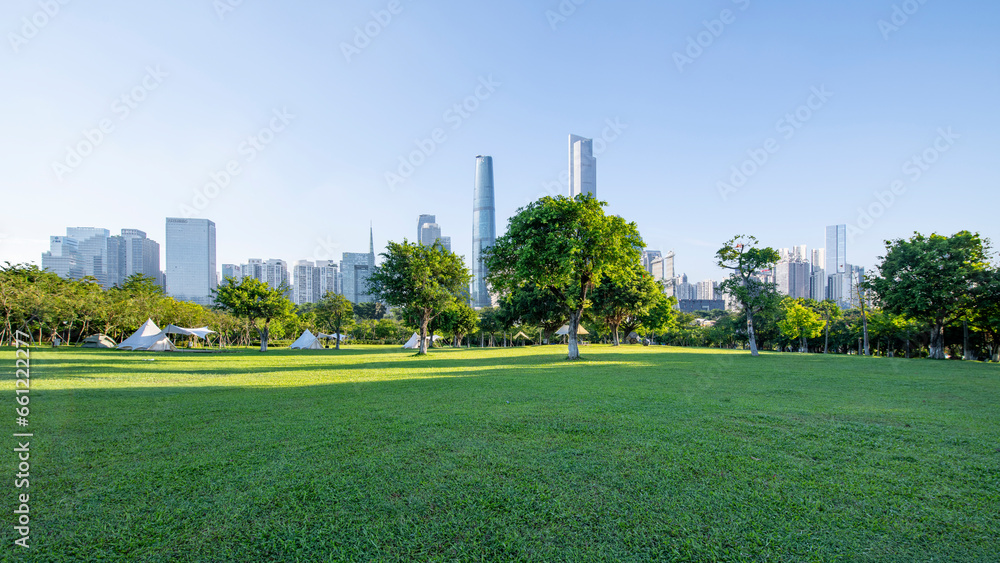 Early morning Guangzhou City Architecture and Park Camping Grassland
