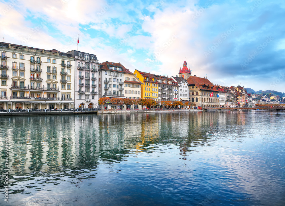 Fabulous historic city center of Lucerne with famous buildings and calm waters of Reuss river.