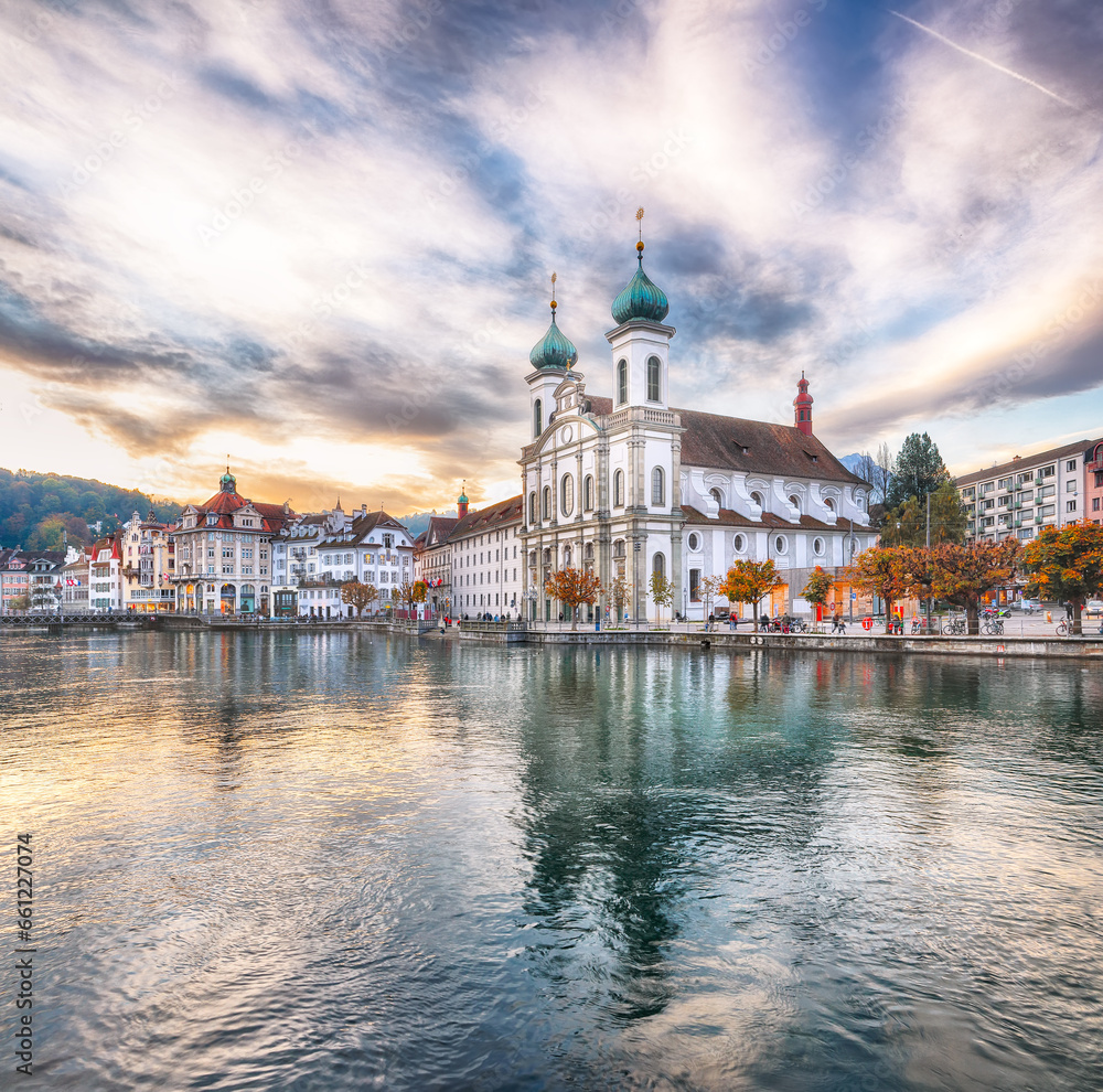 Stunning historic city center of Lucerne with famous buildings and lake Jesuitenkirche Church.