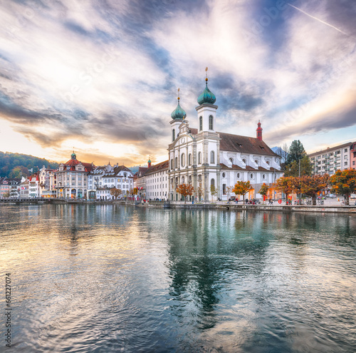 Stunning historic city center of Lucerne with famous buildings and lake Jesuitenkirche Church. © pilat666