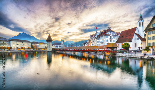 Breathtaking historic city center of Lucerne with famous buildings and old wooden Chapel Bridge (Kapellbrucke) © pilat666