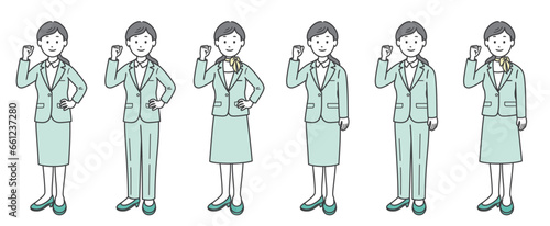 ガッツポーズをする女性ビジネスマン 斜め