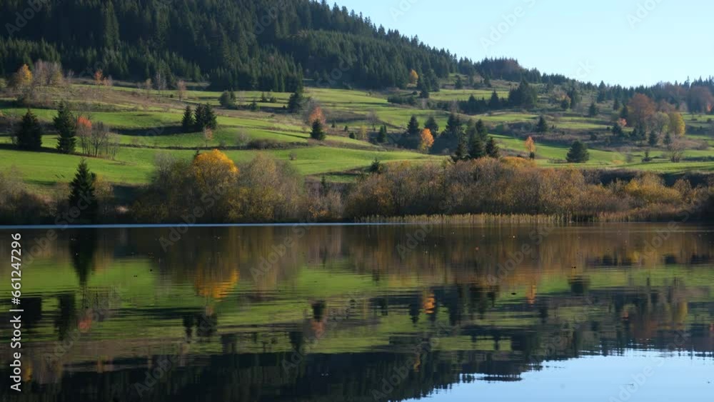 Mountain lake in autumn day Mountain lake in autumn day