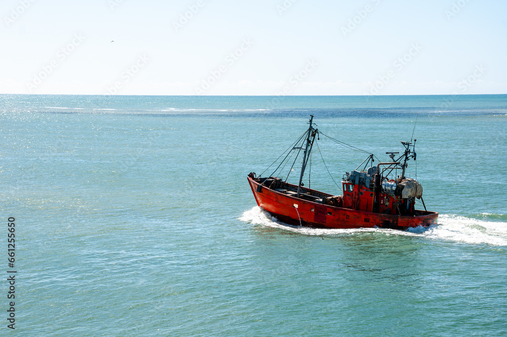 Trawler fishing vessel, leaving the Port of Mar del Plata, Argentina. Trawler fishing vessel, leaving the Port of Mar del Plata, Argentina.