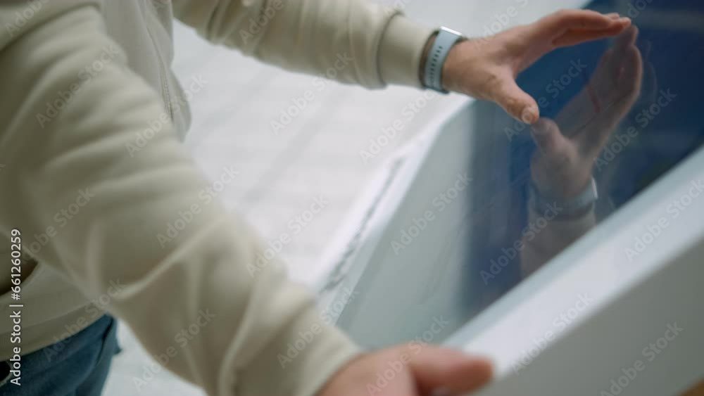 Man looking for information and location of shopping place on digital touch screen in shopping mall 4K Man looking for information and location of shopping place on digital touch screen in shopping mall 4K