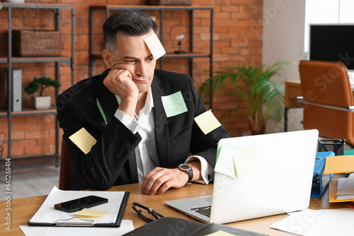 Stressed businessman with s...