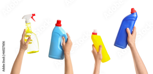 Women with bottles of detergent on white background