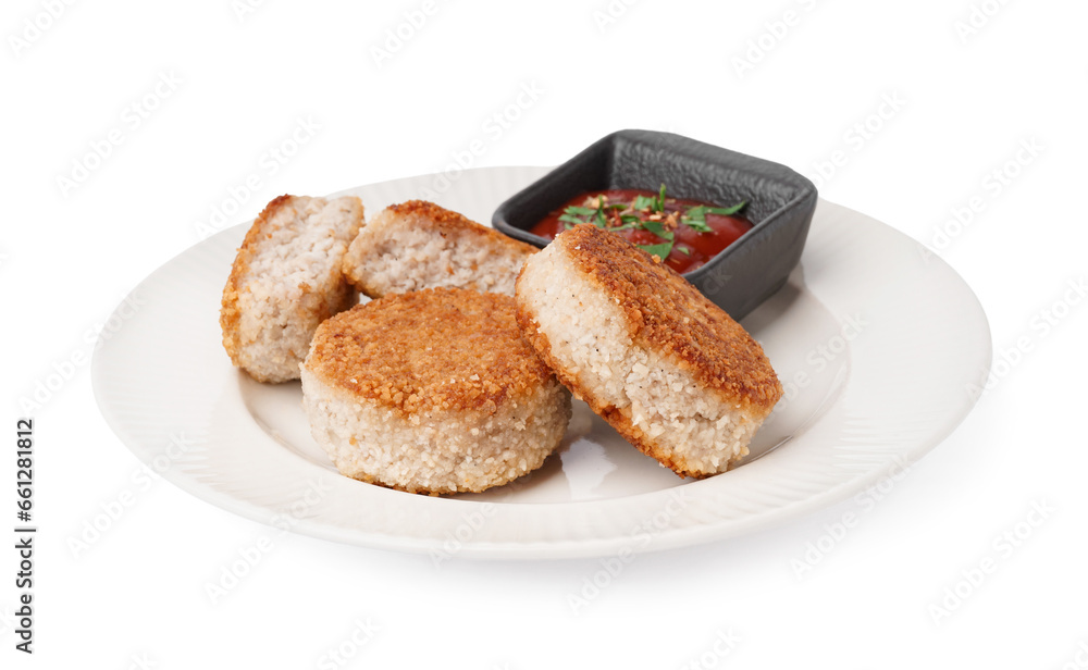 Plate with tasty meat cutlets and sauce on white background