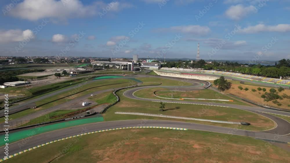 drone view of race track circuit in Brazil Interlagos circuit. cars, people gathered and asphalt drone view of race track circuit in Brazil Interlagos circuit. cars, people gathered and asphalt