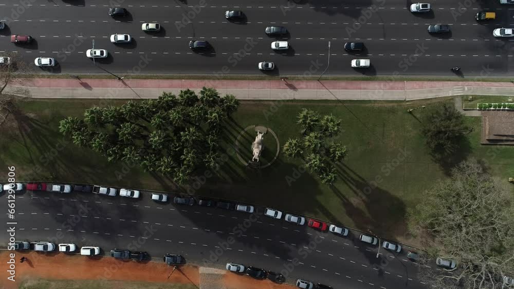 Aerial overhead shot of an avenue in Buenos Aires city Argentina during day time with fluent traffic going on. Aerial overhead shot of an avenue in Buenos Aires city Argentina during day time with fluent traffic going on.