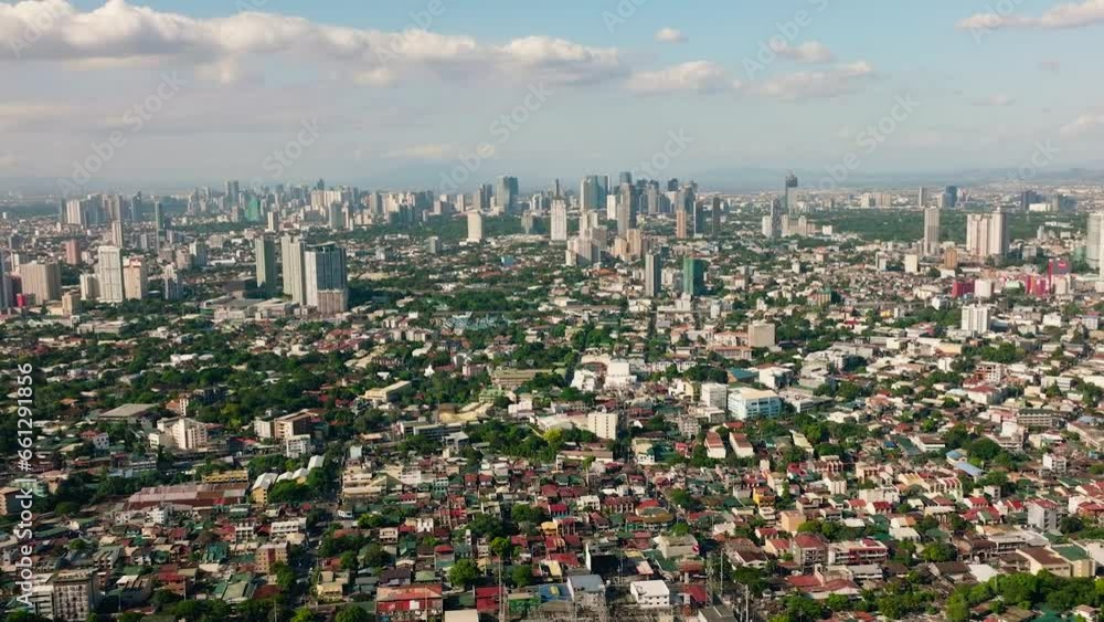Aerial view of Manila city, the largest metropolis of Asia with skyscrapers and modern buildings. Philippines. Aerial view of Manila city, the largest metropolis of Asia with skyscrapers and modern buildings. Philippines.