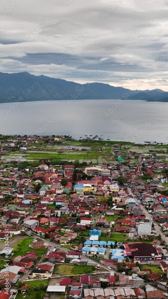Takengon city and Laut tawar lake view from above. Sumatra, Indonesia. Takengon city and Laut tawar lake view from above. Sumatra, Indonesia.