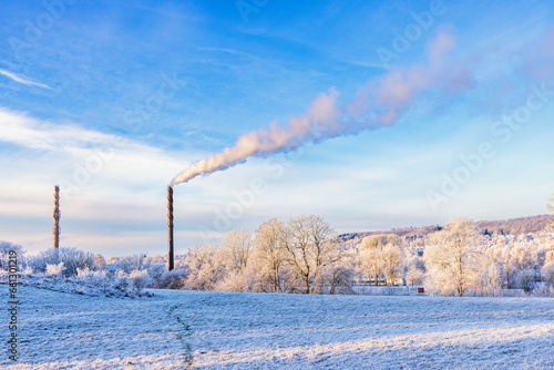Frosty winter day with smoke from chimneys