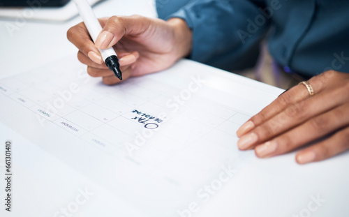 Woman, hands and marker on calendar for tax, deadline or reminder in schedule planning or strategy on desk at office. Closeup of female person writing on paper for agenda, memory or plan at workplace