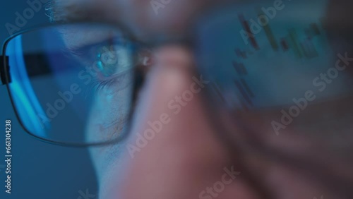 Wallpaper Mural Stock Market Trader Working Investment Charts, Graphs, Ticker, Diagrams Projected on Reflecting in Glasses. Macro shot Torontodigital.ca