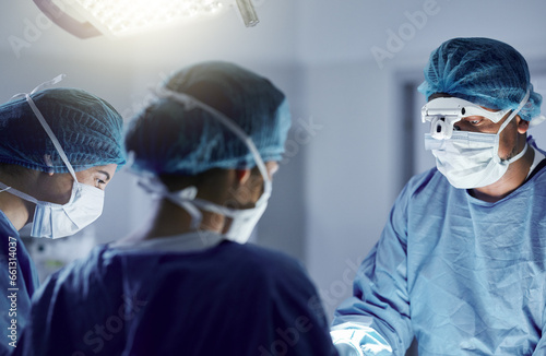 Obraz na płótnie Surgery, team and mask on face with glasses for medical, healthcare and working in operation room