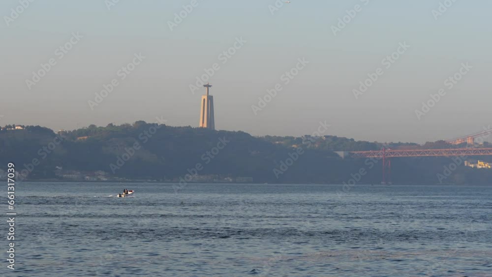Jesus statue in Lisbon. 4K video with this landmark building from Lisbon and the gate that looks similar to the one in San Francisco. travel to Portugal. Jesus statue in Lisbon. 4K video with this landmark building from Lisbon and the gate that looks similar to the one in San Francisco. travel to Portugal.