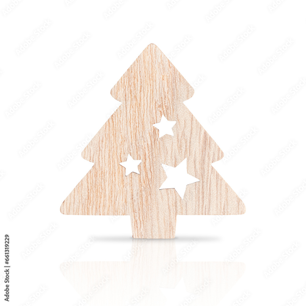 Obraz premium Single wooden sustainable christmas or new year decoration of fir tree shape of brown colour with carved stars isolated on white background with reflection used for winter holiday celebration design