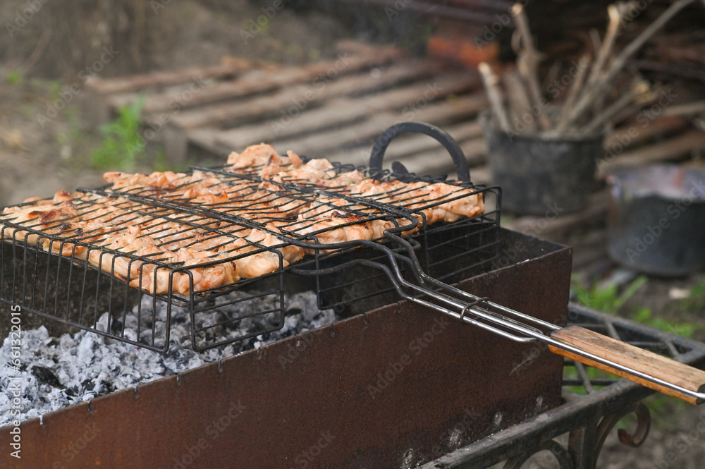 chicken meat is cooked on the grill chicken meat is cooked on the grill