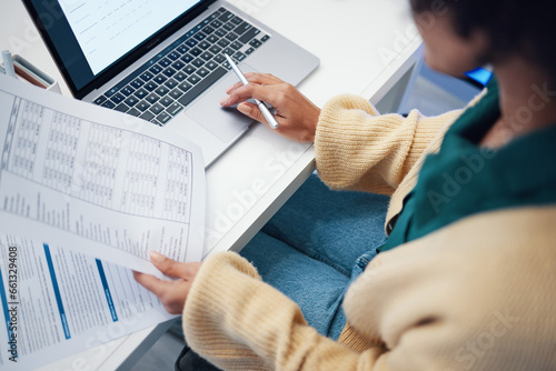 Closeup, finance and woman with documents, laptop and accounting with budget, planning and internet. Person, accountant and worker with a pc, paperwork and investment with payment and transactions photo