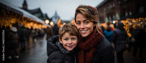 portrait of a mother and her child at a german christmas market