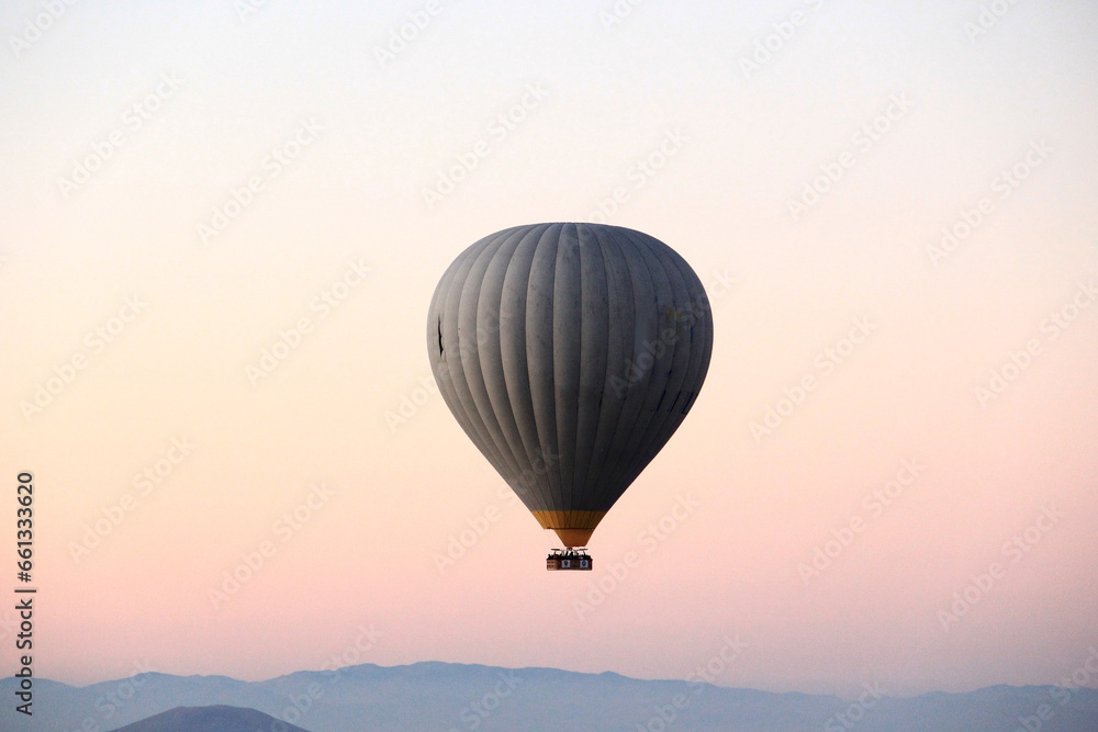 Flying balloon at dawn in Cappadocia,Turkey.
