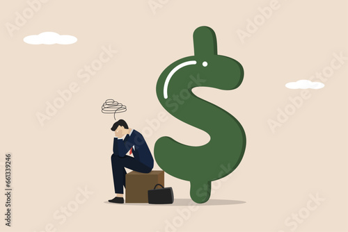 Unemployment causing financial problems, bankrupt office workers, depressed unemployed businessmen sitting with big dollar bills.