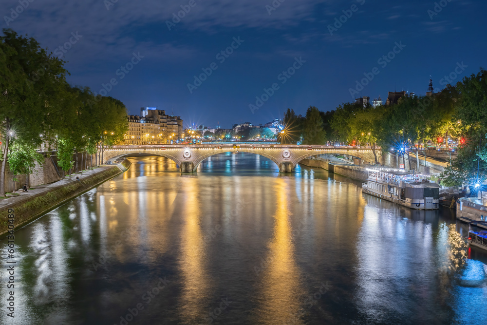 By the river Seine in Paris at night