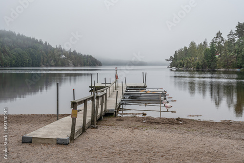 Lake Ragnerudssjoen in Dalsland Sweden beautiful nature forest pinetree swedish houses